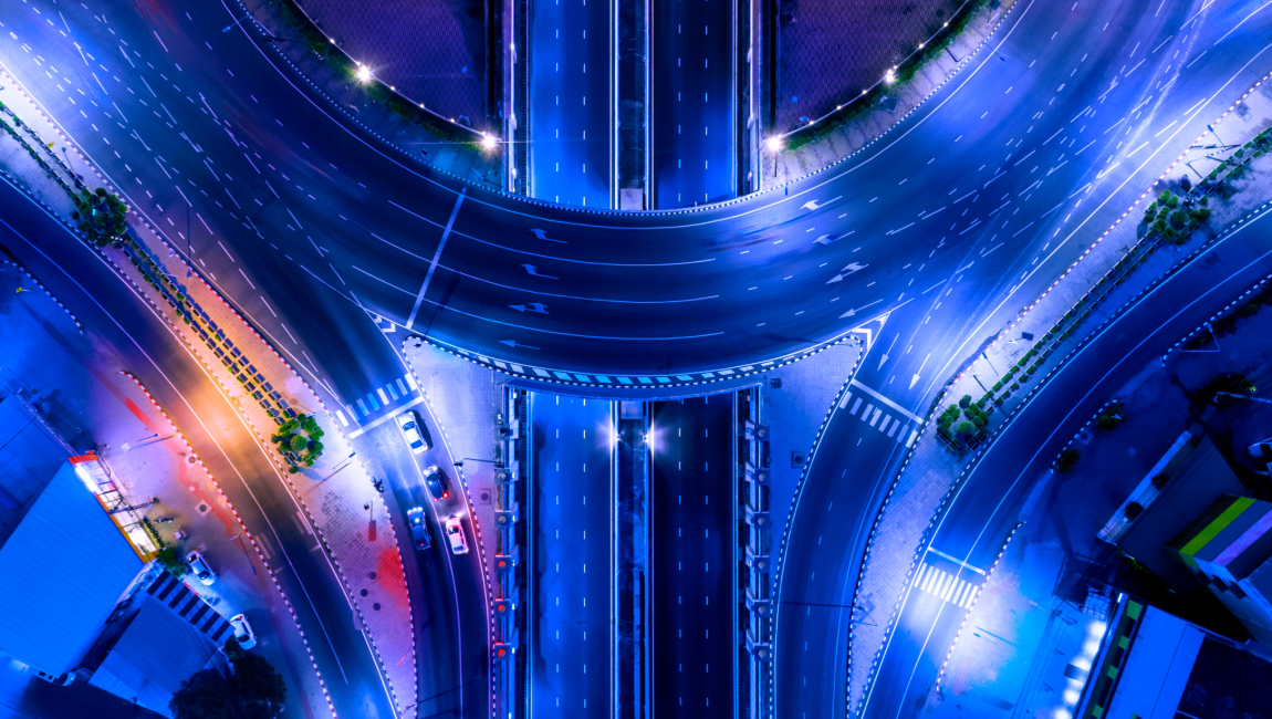 Aerial view of intersecting highways at night