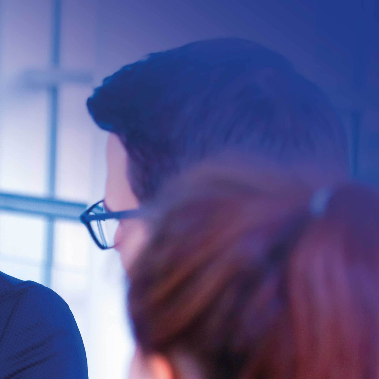 Continuation of colleagues at a conference table